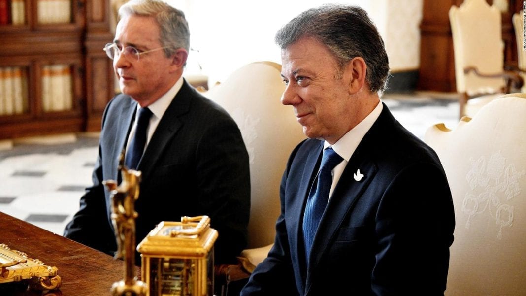 Juan Manuel Santos y Álvaro Uribe Vélez