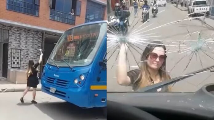 Mujer Utiliza Martillo para Romper los Vidrios de un Autobús del SITP